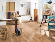 foto ambientata in una scena luminosa e moderna di un Pavimento in laminato da 8mm BAUFLOOR BORDEAUX 