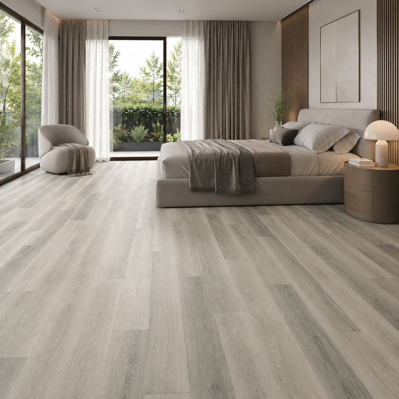 Pavimento SPC Baufloor Ghiaccio 6 mm effetto legno grigio chiaro in camera da letto moderna