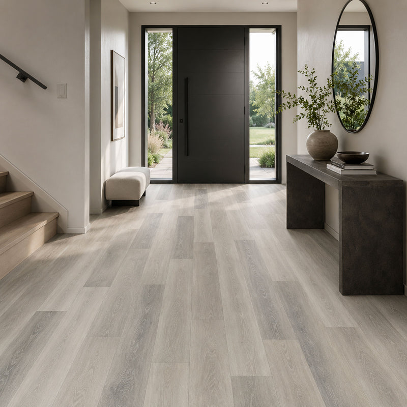 Pavimento SPC Baufloor Ghiaccio 6 mm effetto legno grigio chiaro in ingresso moderno