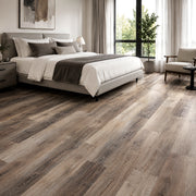 Pavimento SPC Baufloor Sole 5 mm effetto legno naturale multitonale in camera da letto