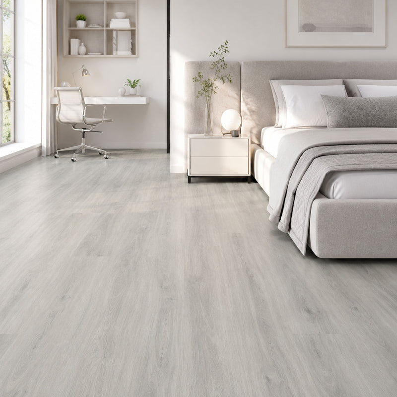 Pavimento Baufloor Topazio 5 mm in camera da letto con effetto legno grigio chiaro