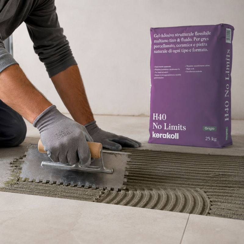 Applicazione Kerakoll H40 No Limits con spatola dentata per posa piastrelle