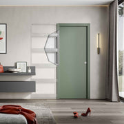 Controtelaio Scrigno OPENBOX installato, con vista sulla struttura interna in cartongesso e porta scorrevole verde. Soluzione salvaspazio