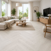 Pavimento SPC spina di pesce Baufloor Loom 8 mm effetto legno chiaro in soggiorno moderno