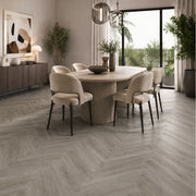 Pavimento SPC spina di pesce Baufloor Twill 8 mm effetto legno grigio in sala da pranzo moderna