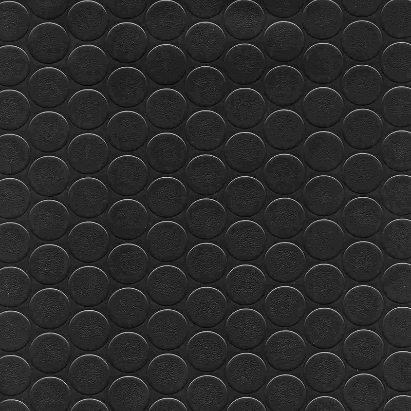 Dettaglio ravvicinato della superficie a bolle del pavimento in PVC nero, ideale per garantire il massimo grip